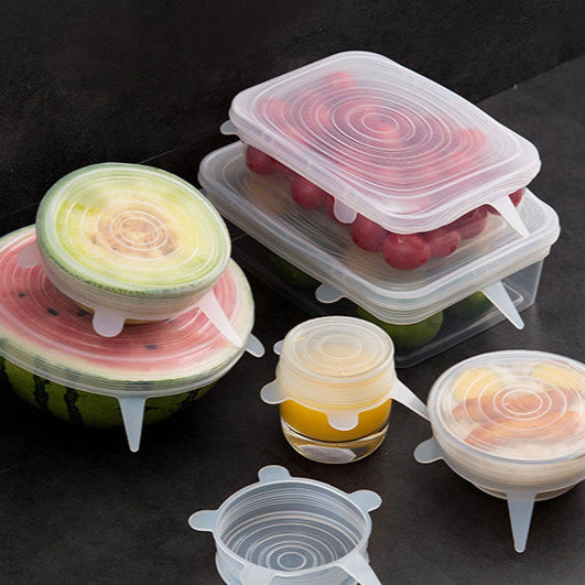 Set of silicone food covers on a dark surface